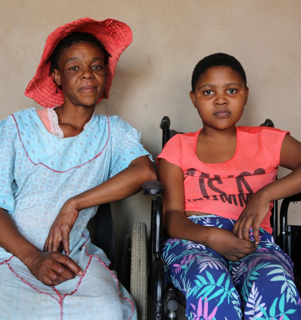 Nthabeleng Mokatisi and her daughter Mamello, who is in a wheelchair, desperately need assistance.   Photo by Joshua Sebola   