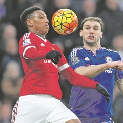 Anthony Martial of Man United moves past Chelsea’s Branislav Ivanov. (Catherine Ivill, AMA, Getty Images)