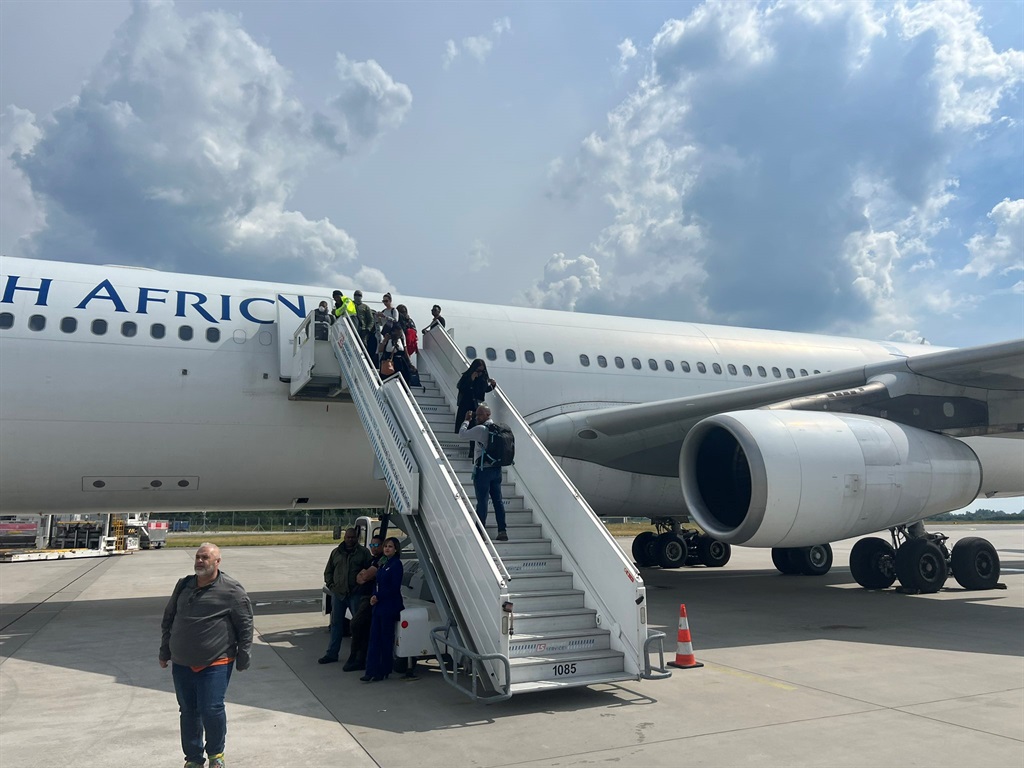 Journalists and the presidential security detail were left stranded on a plane in Poland, and were not allowed to disembark. Photo: Pieter du Toit/Twitter