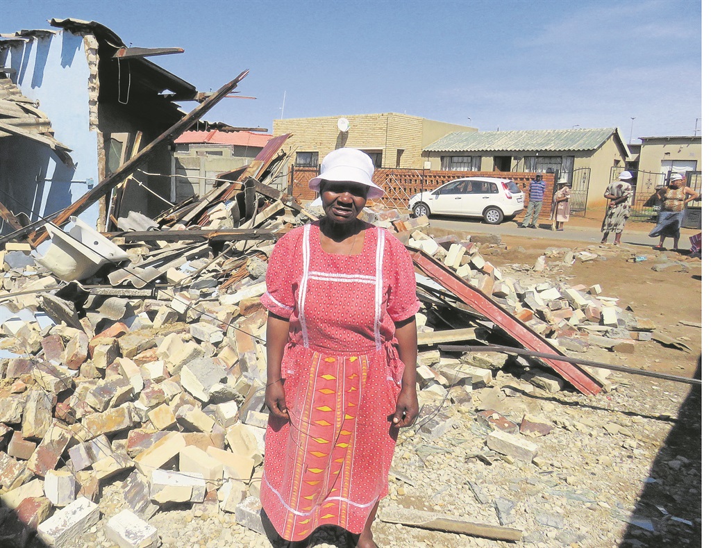 Gogo Hilda Mbatha’s house was reduced to rubble after being bulldozed yesterday. She claims the house was destroyed by a man who said he is the rightful owner.    Photo by Ntebatse Masipa  
