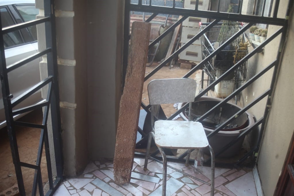 Thugs used this concrete log to knock on the burglar door and forced it open. Photo by Phineas Khoza