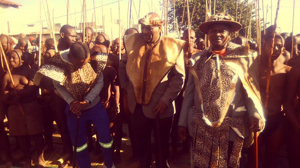 Chief Solly Nkoana (middle) with Mphulo Nkoana and Simon Ntuli dancing with the new initiates. Photo by Bongani Mthimunye