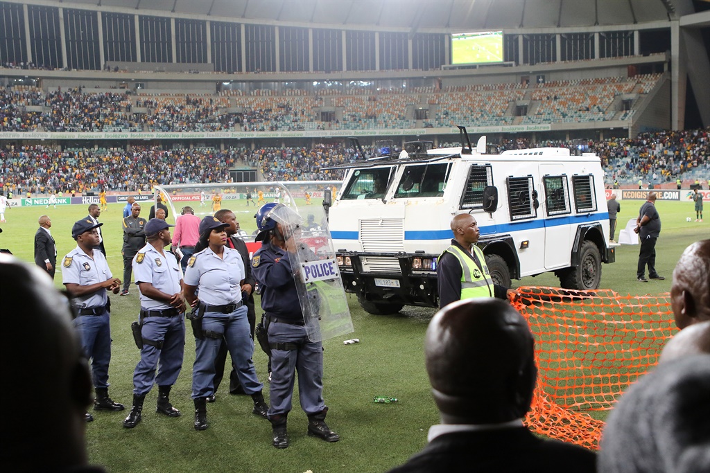 Police had their hands full at the Moses Mabhida Stadium on Saturday night. Photo: Gallo Images