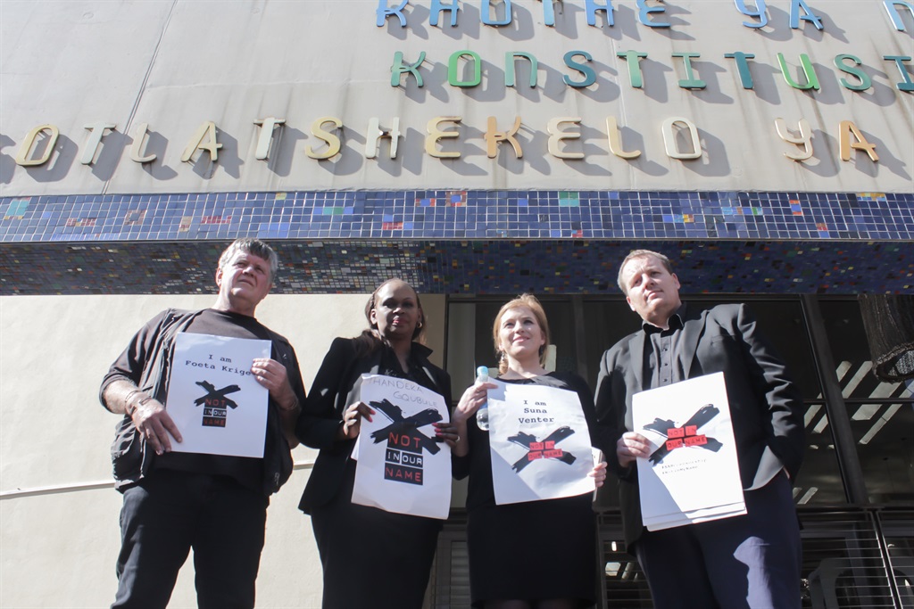 SABC journalists Foeta Krige, Thandeka Gqubule, Suna Venter and Jacques Steenkamp protest outside the Constitutional Court.  Picture: Claudi Mailovich 