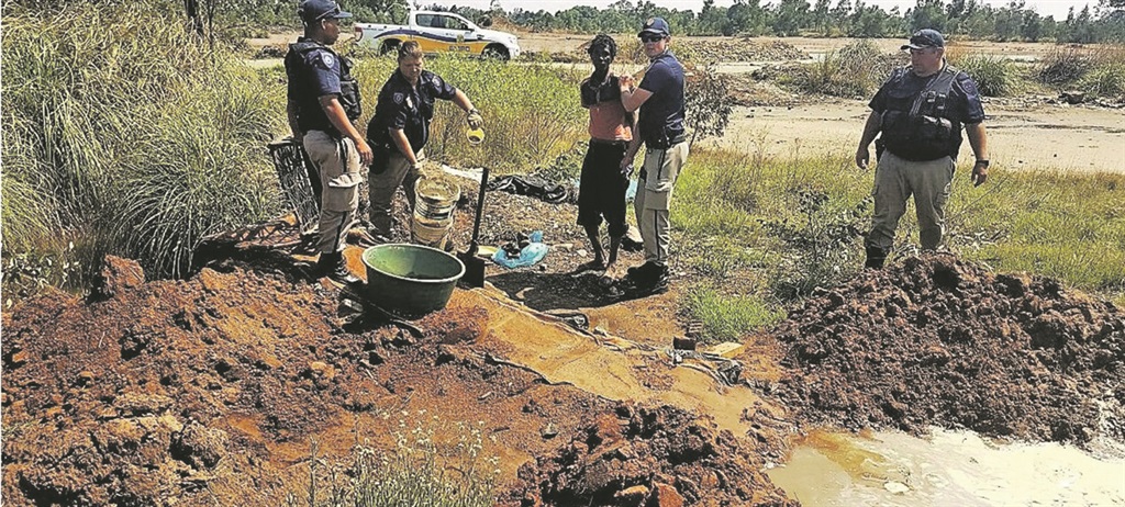 Six illegal miners were arrested at this site near New Modder Road in Benoni, Ekurhuleni, yesterday morning. 