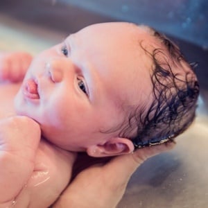 Don't be in too much of a hurry to bath your newborn. 