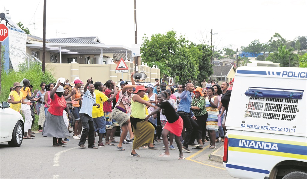 Residents marched to Vela Police Station to hand over their letter of concerns.               Photo by Siyabonga Simelane 