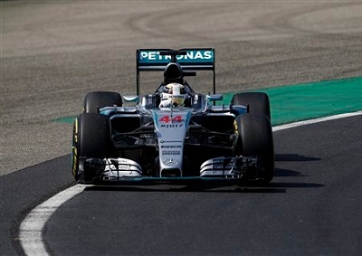 <b>QUICKEST IN HUNGARY:</b> Lewis Hamilton topped the time sheets during the third and final practice session ahead of qualifying for the 2015 Hungarian GP. <i>Image: AP / Darko Vojinovic</i>