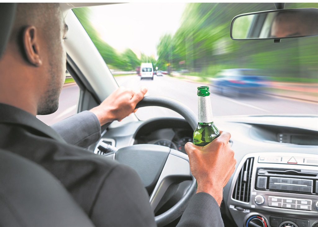 You may think you look cool with a beer behind the wheel, but it is deadly behaviour. 