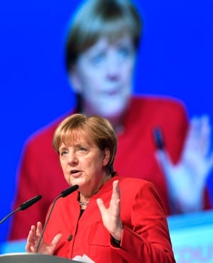 German Chancellor and Chair of the CDU, Angela Merkel, during her speech as part of a general party conference in Essen, Germany. (Martin Meissner, AP)