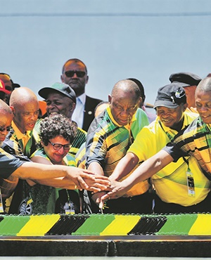 The ANC’s leaders cut a cake during the party’s 106th birthday celebrations at Buffalo Stadium in East London. Party president Cyril Ramaphosa addressed the event and tried to stop the crowd from booing Jacob Zuma. (Leon Sadiki, City Press)
