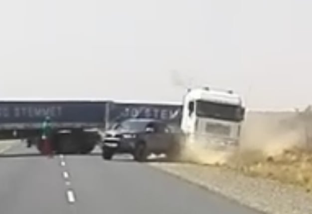 <B>PULLING POWER:</B> This Toyota Hilux pulled that truck out of a ditch. <I>Image: YouTube</I>