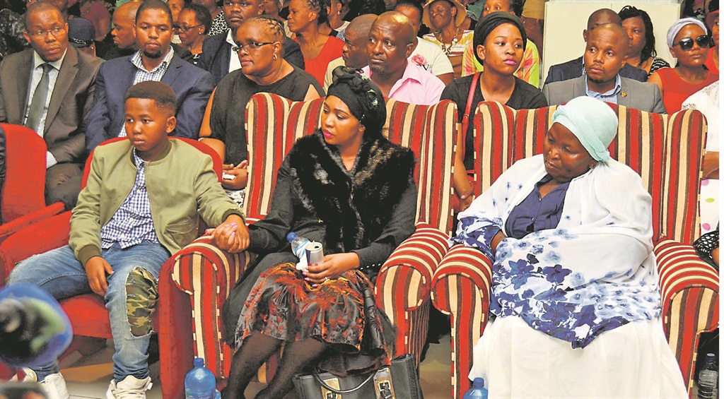 Sfiso’s son Ngcweti and his wife Ayanda Ncwane sit with Sfiso’s mother, Fikile.   Photos by Siyabonga Simelane 