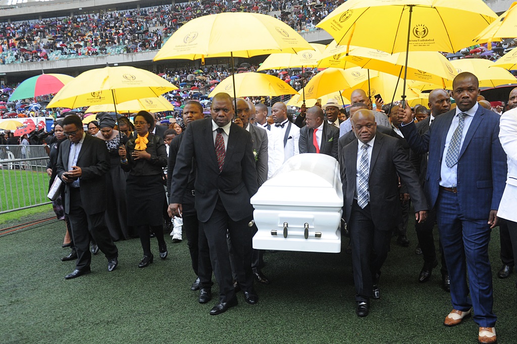 ANC’s treasurer-general Zweli Mkhize and ANC KZN chairperson Sihle Zikalala carrying Sfiso Ncwane’s coffin at the funeral service held at Moses Mabhida Stadium.   Picture: Jabulani Langa 