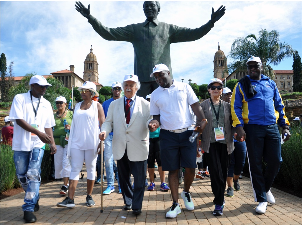 Leading the 5km Nelson Mandela Remembrance Walk from the Union Buildings in Tshwane on Sunday were advocate George Bizos (front, second left), accompanied by Tshwane mayor Solly Msimanga, anti-apartheid activist Sophie de Bruyn and Gauteng Premier David Makhura.                                      Photo by Samson Ratswana 