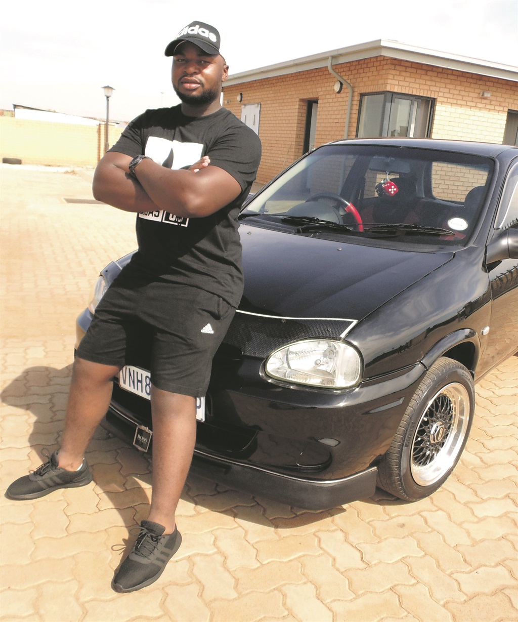 Bonginkosi Maphumulo loves his cat-sized car.             Photo by    Celimpilo Zwane 