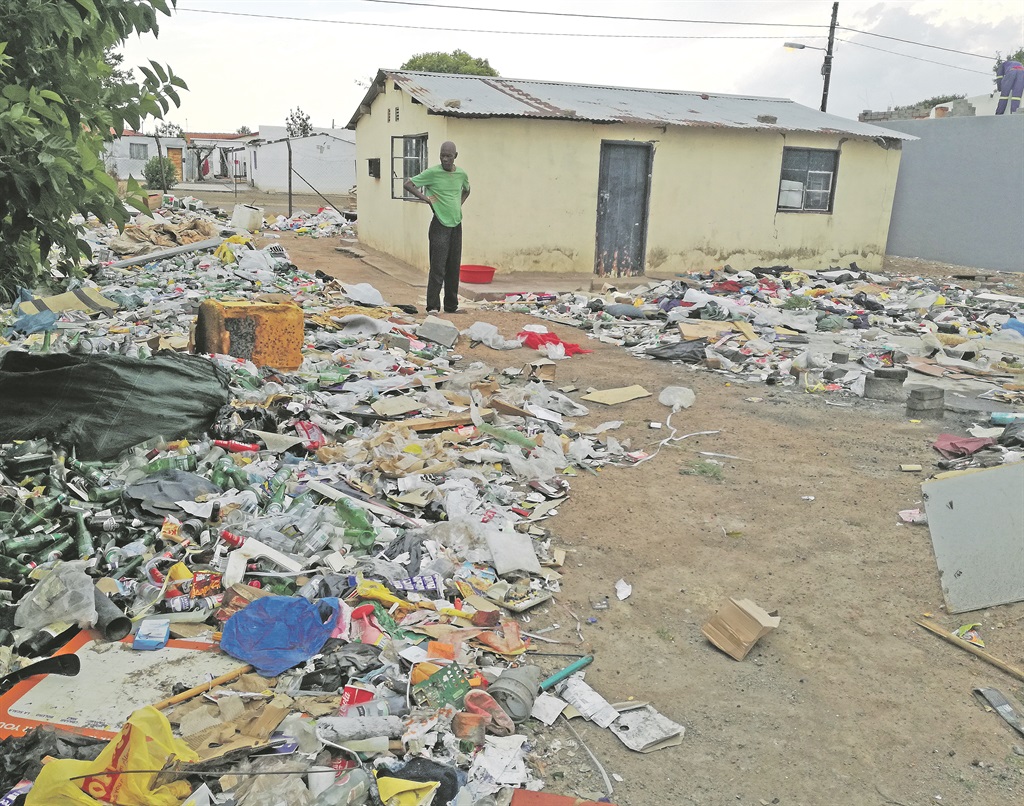 Daniel Kgokane said he is tired of the rubbish in his neighbour’s yard.   Photo by Kgalalelo Tlhoaele 