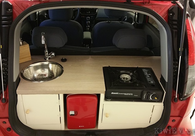 Is that a stove? Driver installs a 'fully functional kitchen' in his little  electric car