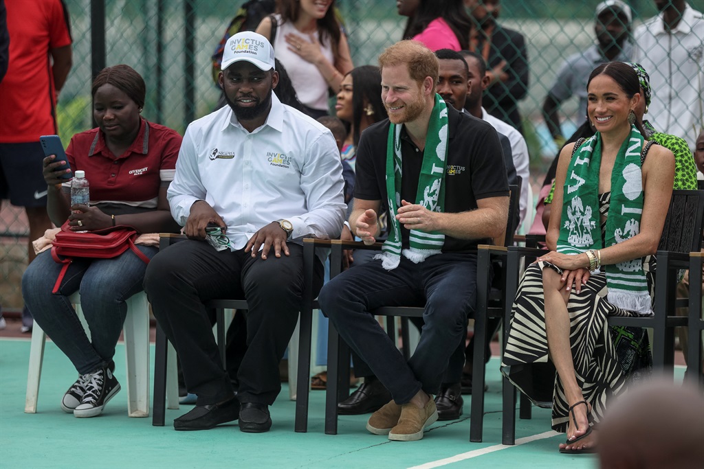 Britain's Prince Harry (2nd R), Duke of Sussex, an