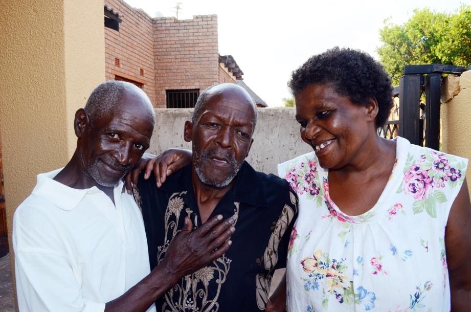 Lucas Masilela (middle) with his sister Phindi Mametsa and her husband, Josia Mametsa, are happy the madala was found.Photo by Happy Mnguni