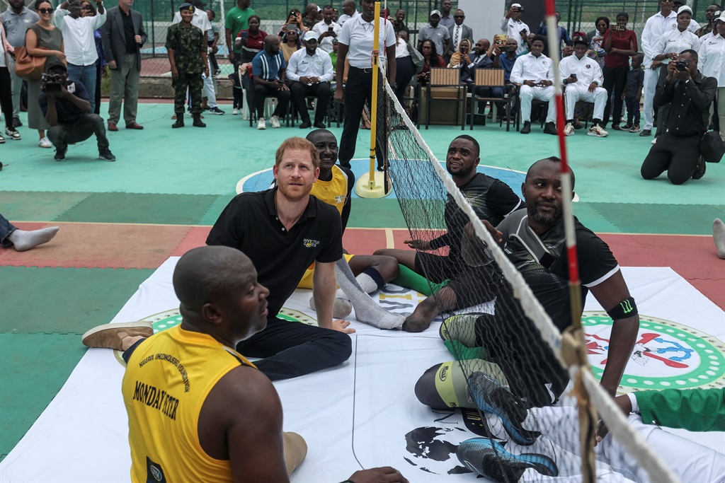 Britain's Prince Harry (2nd L), Duke of Sussex, ta