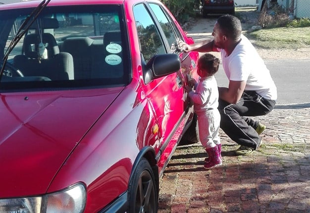 <b>DADDY'S LITTLE GIRL:</b>  Our little one loves washing the car with her Dad. And though he loves it just as much, he has to watch her every move in case she decides to start drawing on his car with mud, or sticks and stones. <i>Image: Wheels24 / Janine Van der Post</i>