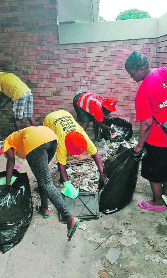 Young people from Lindelani kasi cleaned up the local high school on Friday.  