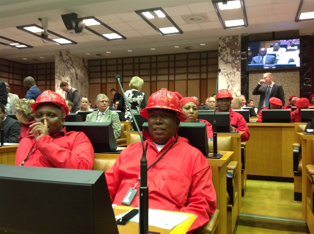 EFF leaders Floyd Shivambu and Julius Malema in their trademark red overalls and hard hats in the National Assembly in Cape Town. Picture: Peter Luhanga