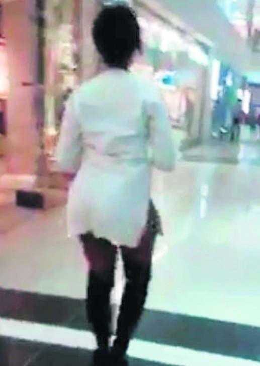 This screengrab from a video shows a woman wearing what some customers said were revealing clothes at Menlyn Mall.