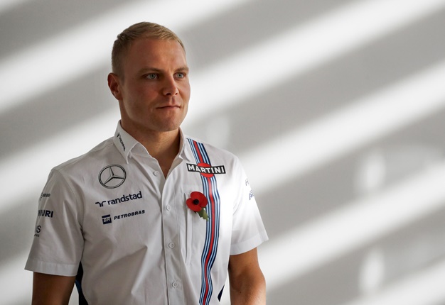<B>MAN OF THE MOMENT:</B> Valtteri Bottas' move to Mercedes can either break his career... or make it. <I>Image: AFP / Adrian Dennis</I>