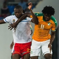 Chancel Mbemba of Congo RD and Franck Yannick Kessie of Ivory Coast during the African Nations Cup match played in Oyem. 