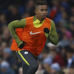 Manchester City's Gabriel Jesus runs along the touchline as he warms up during the match against Tottenham Hotspur. (Dave Thompson, AP)