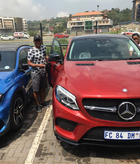 Thuso Phala next to his Mercedes-Benz 63 AMG. Photo: Instagram