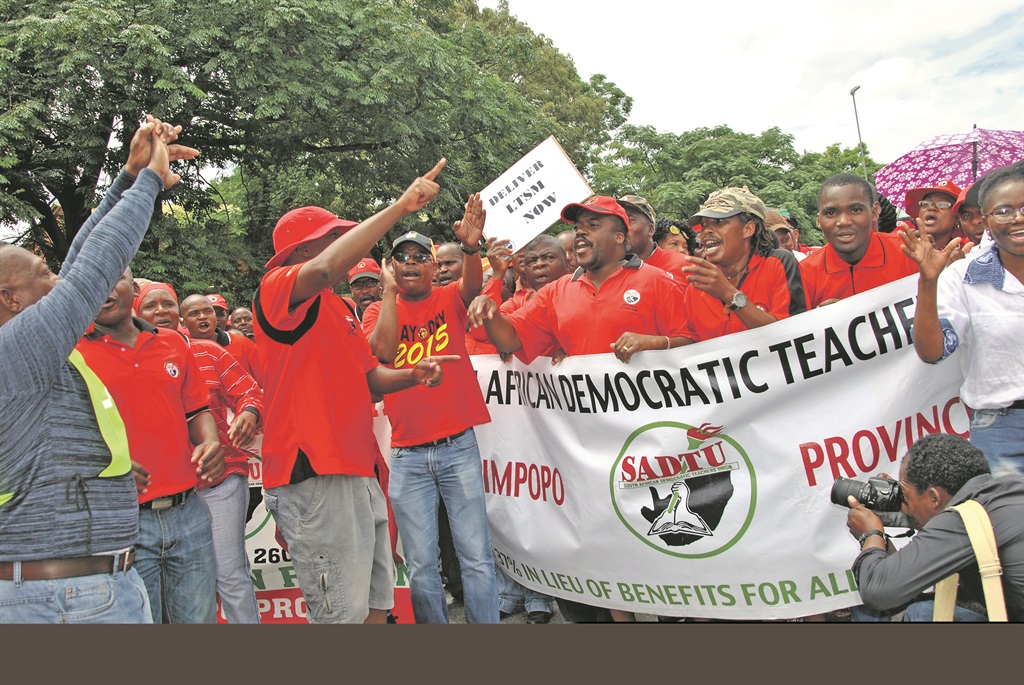 SADTU members marchednto the provincial offices of education department seeking answers from the MEC Ishmael Kgetjepe. Photo by Phuti Raletjena Photo by   