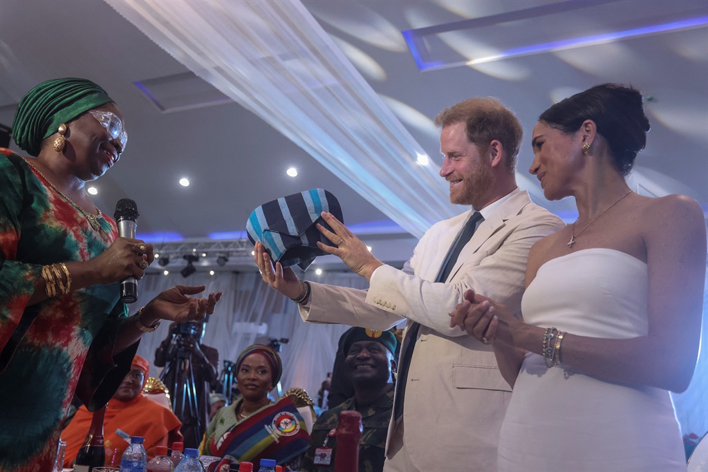 Britain's Prince Harry (2nd L), Duke of Sussex, an