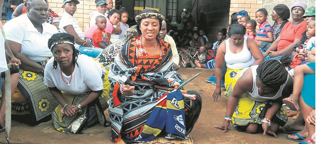 Gobela Nontsikazi Mtshali(centre), from Zola, Soweto, celebrates 20 years of being a sangoma and thanks her ancestors for making her the person that she is today. Photo by Sibonelo Zwane  