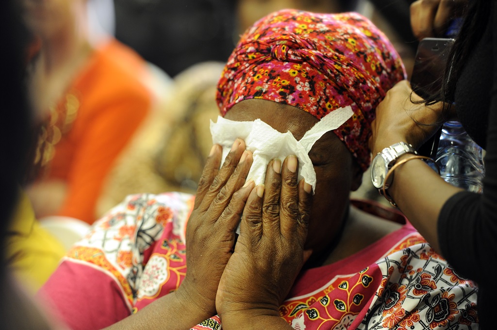  Family members of the 94 patients who died attend a briefing in Pretoria by the health ombud, Malegapuru Makgoba. Picture: Felix Dlangamandla  