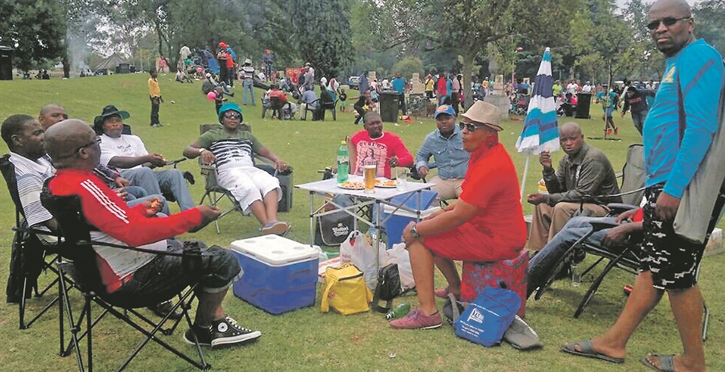 The members of Stimela Club 09 may look relaxed, but their social work is important. 