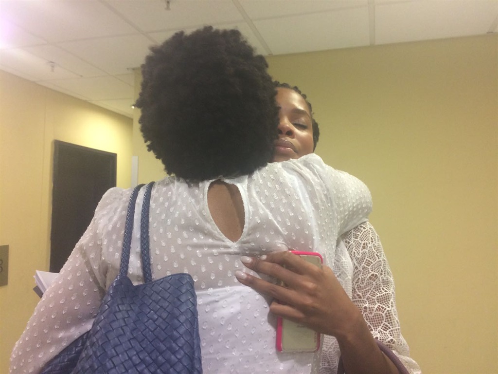 Sihle Bolani is comforted by her mother Phumla following court proceedings in January. Picture: Tshidi Madia, News24