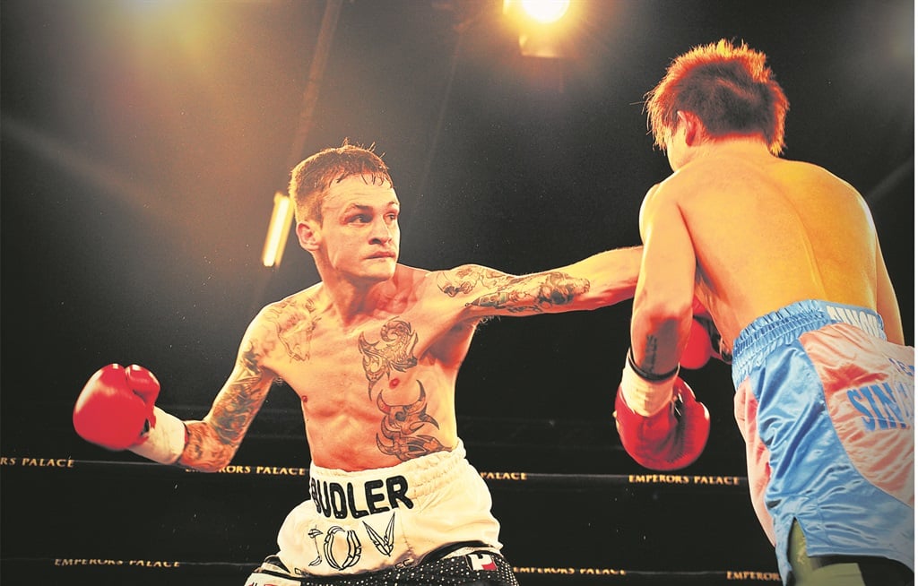 PUNCH DRUNK Hekkie ‘Hexecutioner’ Budler stopped Joey Canoy in his tracks at the beginning on the eighth round at Emperors Palace for the International Boxing Organisation junior flyweight title. Picture: Leon Sadiki 