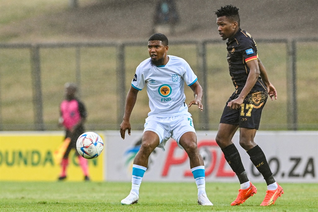 DURBAN, SOUTH AFRICA - APRIL 29: Lyle Lakay of Cape Town City FC and Shaune Mogaila of Royal AM during the DStv Premiership match between Royal AM and Cape Town City FC at Chatsworth Stadium on April 29, 2023 in Durban, South Africa. (Photo by Darren Stewart/Gallo Images)