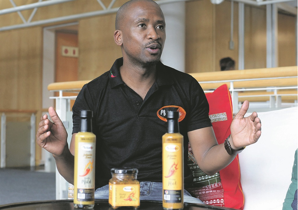 Terence Leluma is a co-founder of Makhamisa, a company started by his love of his father-in-law’s secret relish.           Photo by Trevor Kunene 