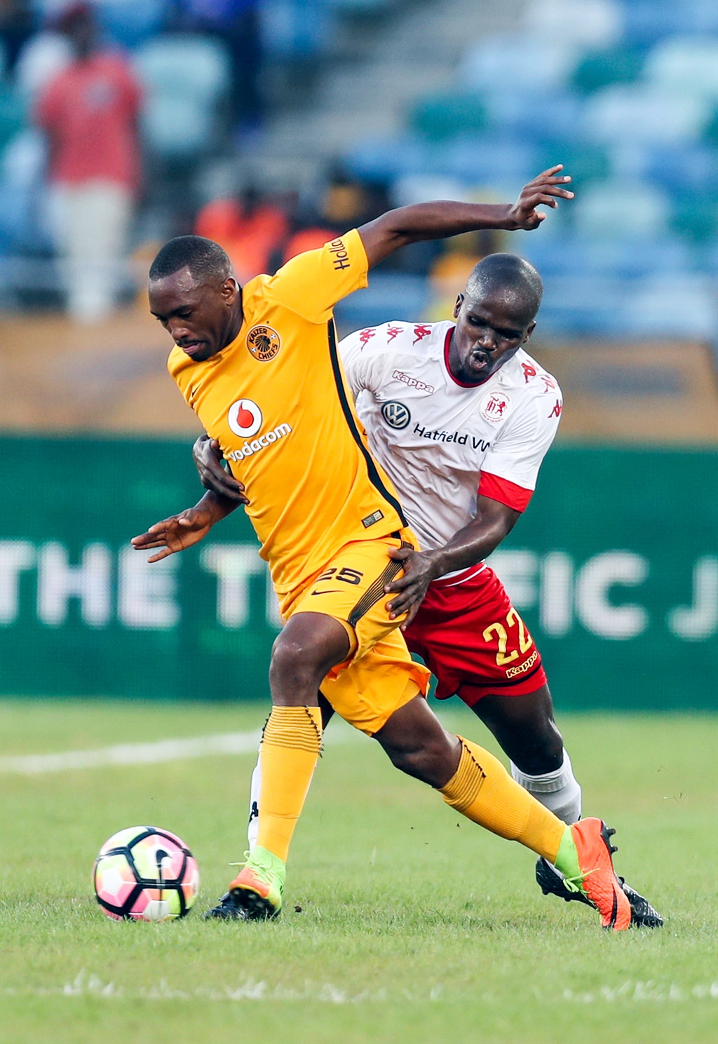 Zamuxolo Ngalo of Highlands Park with a tackle on Bernard Parker of Kaizer Chiefs during the Absa Premiership match between Kaizer Chiefs and Highlands Park at Moses Mabhida Stadium on February 18, 2017 in Durban, South Africa.