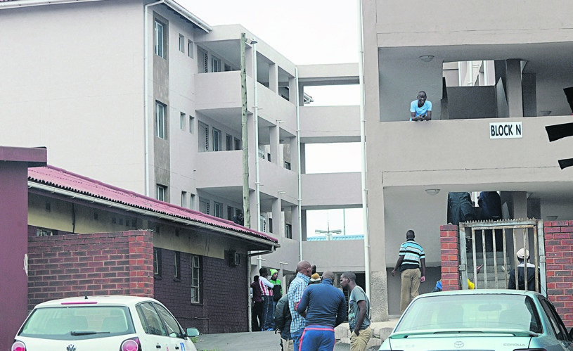Beneficiaries couldn’t move into the new flats at Jacobs Hostel after a group of protesters stopped them on Sunday. Photo by Jabulani Langa