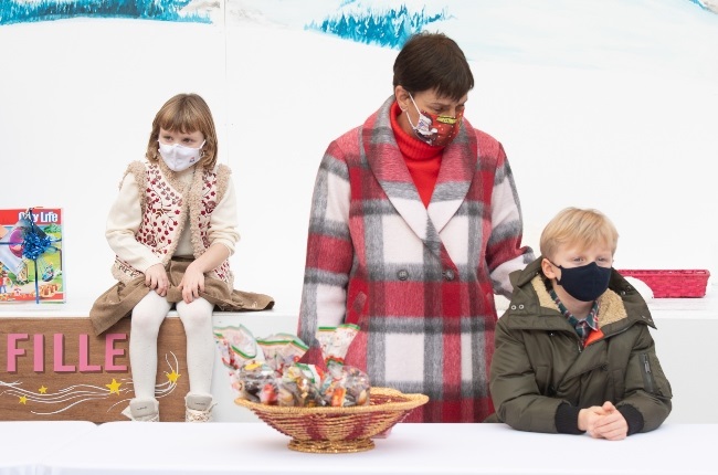 Festive fun (from left): Monaco's Princess Gabriella, her aunt Princess Stéphanie and brother, Prince Jacques, prepare to hand out Christmas gifts. (PHOTO: Gallo Images/Getty Images)