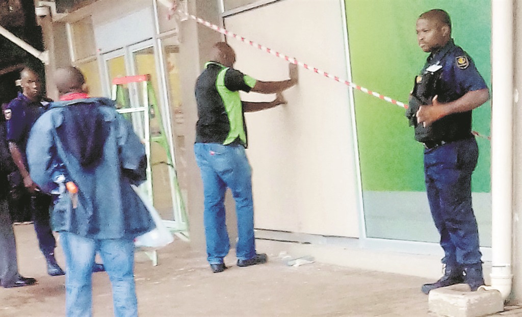 A car crashed into the front door of this bank on Monday. Photo by Mbali Dlungwana