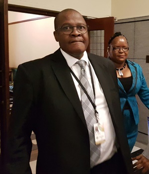 Straight into it: Brian Molefe make his way through the corridor with deputy chief whip Doris Dlakude,  after attending his first ANC caucus meeting in the Old Assembly. Dlakude confirmed that Molefe had been sworn in this morning. Picture: Janet Heard