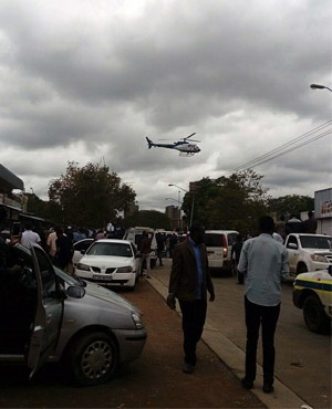 Police helicopters hover overhead during protests in Pretoria. Photo by Nation Nyoka/News24