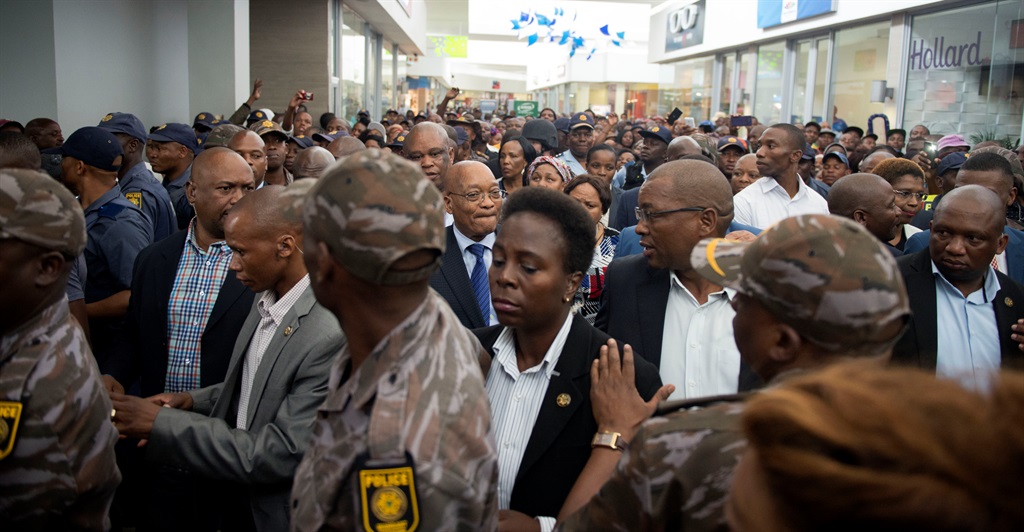 President Jacob Zuma walks through a shopping centre in Soshanguve on February 28 2017 during a visit to see the extent that drug abuse and crime have had on the area. Picture: Deaan Vivier/Netwerk24