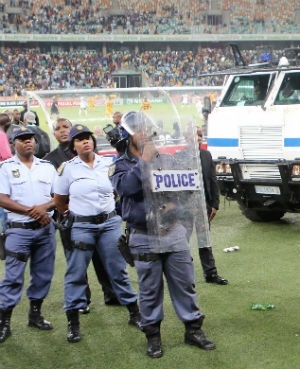 Police react after crowd violence during the Nedbank Cup Semi Final match between Kaizer Chiefs and Free State Stars at Moses Mabhida Stadium. (Anesh Debiky, Gallo Images)